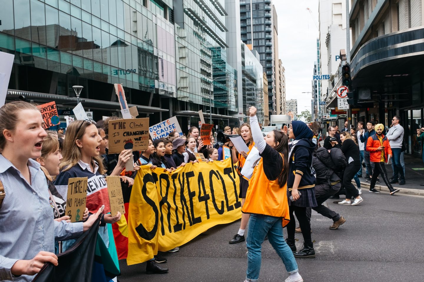 Climate strike demonstrators march down King William Street, Adelaide