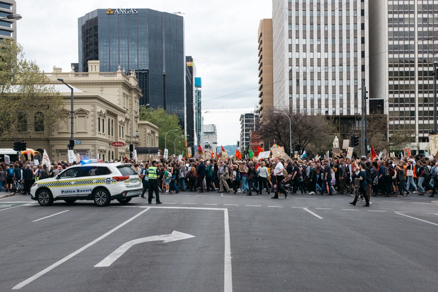 Climate strike demonstrators march down King William Street, Adelaide