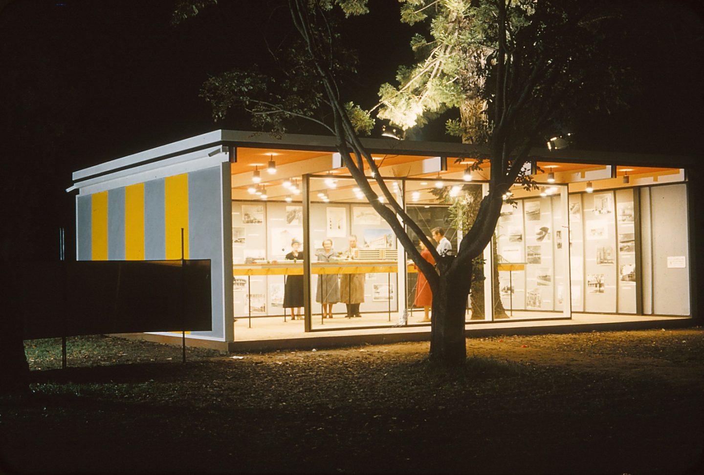 Timber and glass pavilions at the Sixth Australian Architectural Exhibition in Botanic Park, 1956