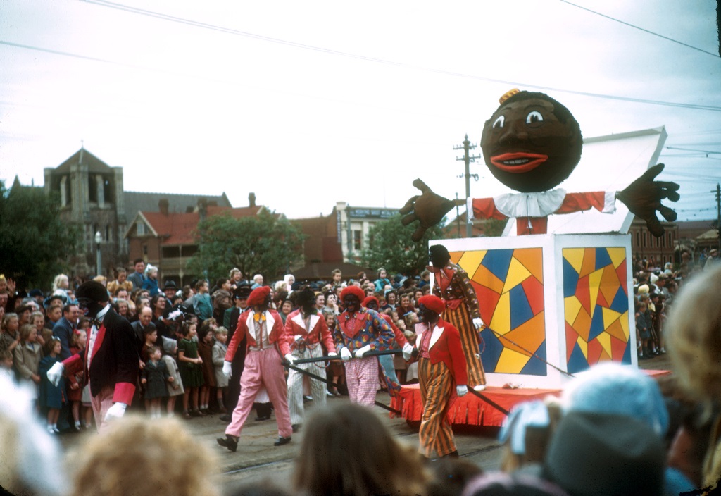 A Jack-In-The-Box float from 1950, pulled by four men in golliwog attire