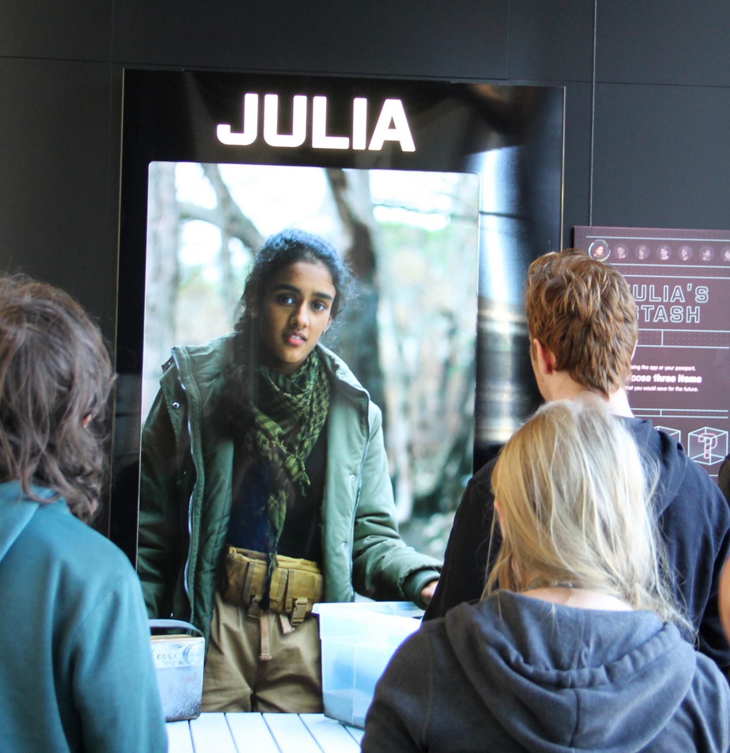 In Julia's scenario, visitors are invited to choose what three items they would include in their survival pack