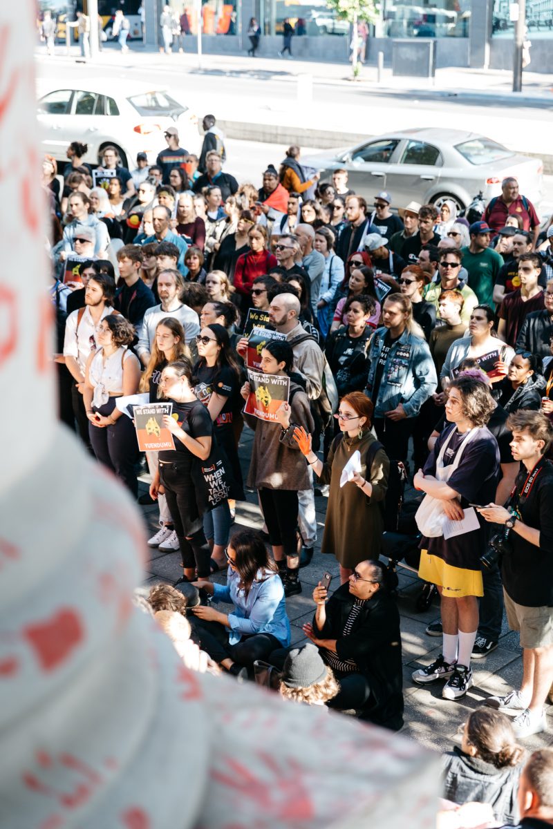 Hundreds rally in front of Parliament House in solidarity with the Yuendumu community