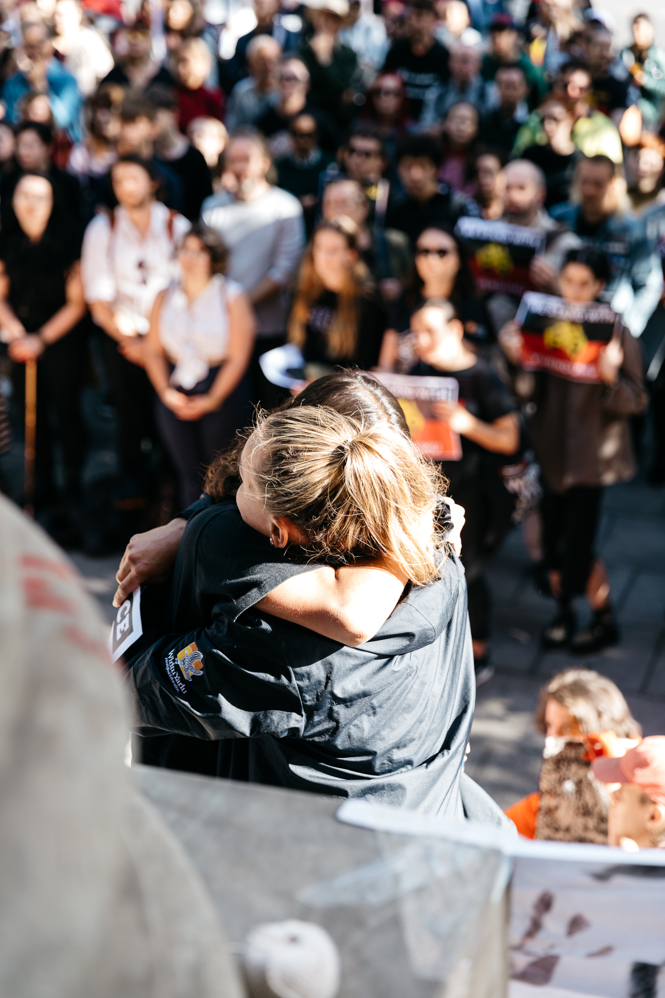 Hundreds rally in front of Parliament House in solidarity with the Yuendumu community