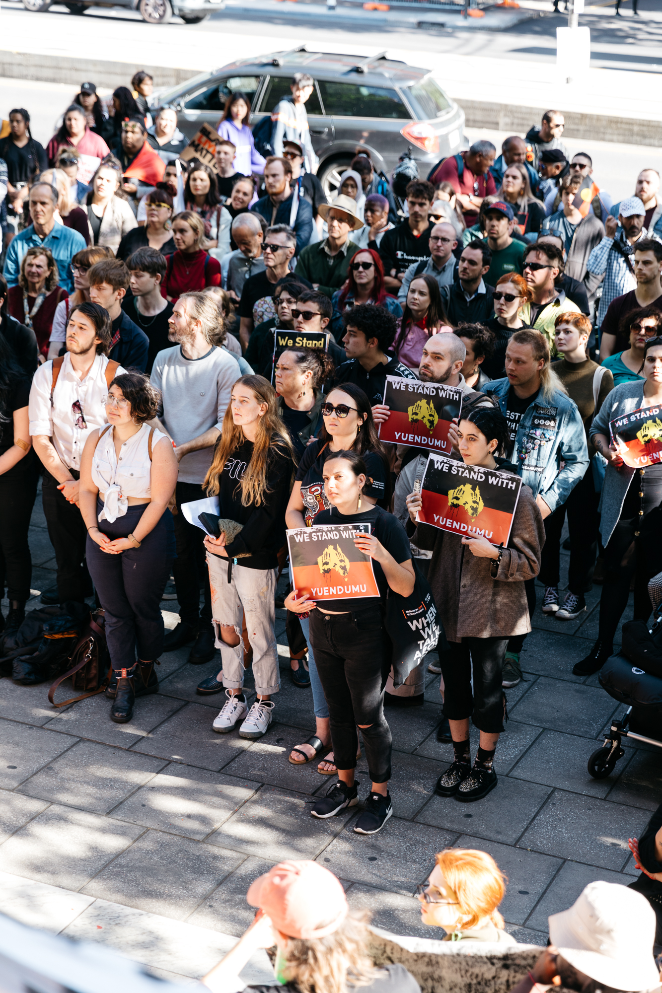 Hundreds rally in front of Parliament House in solidarity with the Yuendumu community