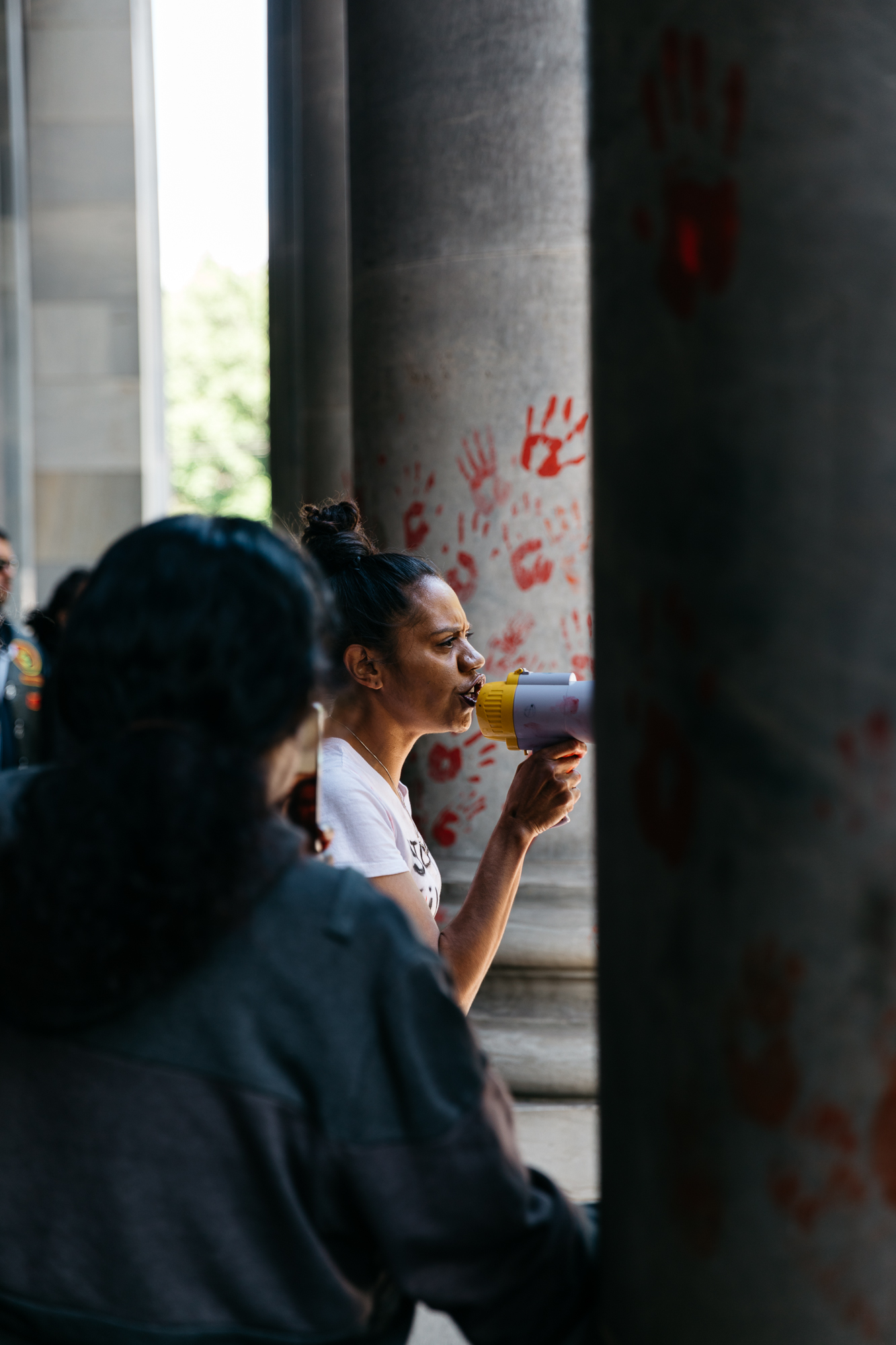 Hundreds rally in front of Parliament House in solidarity with the Yuendumu community