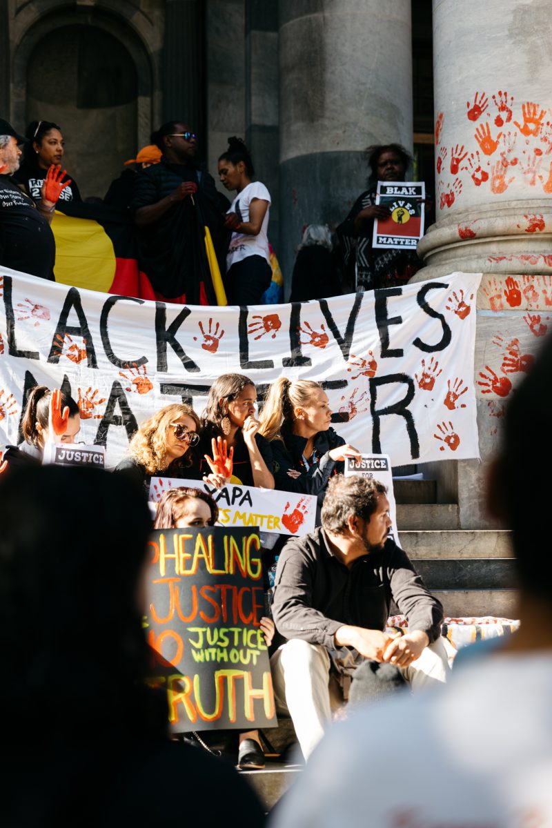 Hundreds rally in front of Parliament House in solidarity with the Yuendumu community