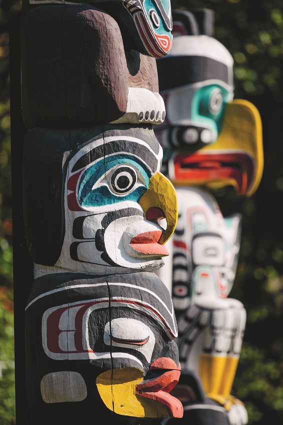 Close up of the totem poles at Lumberman’s Arch in Stanley Park, Vancouver. Photo: Nelson Mouellic. Credit: Tourism Vancouver/Nelson Mouellic.