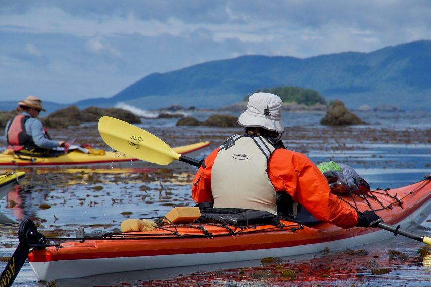Kayakers explore a reef off Checkaklis Island, British Columbia (Photo: Daniel Bruce Lacy / Shutterstock)